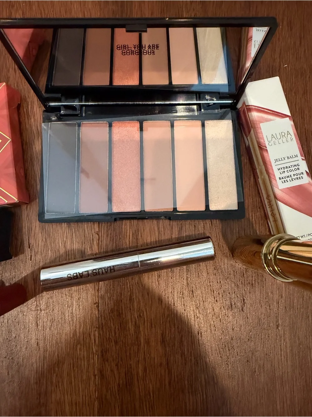 Laura Geller shadow palette, nars lip, Laura Geller gloss, haus mascara